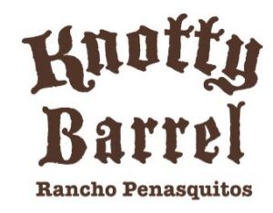 A brown logo for knotty barrel.